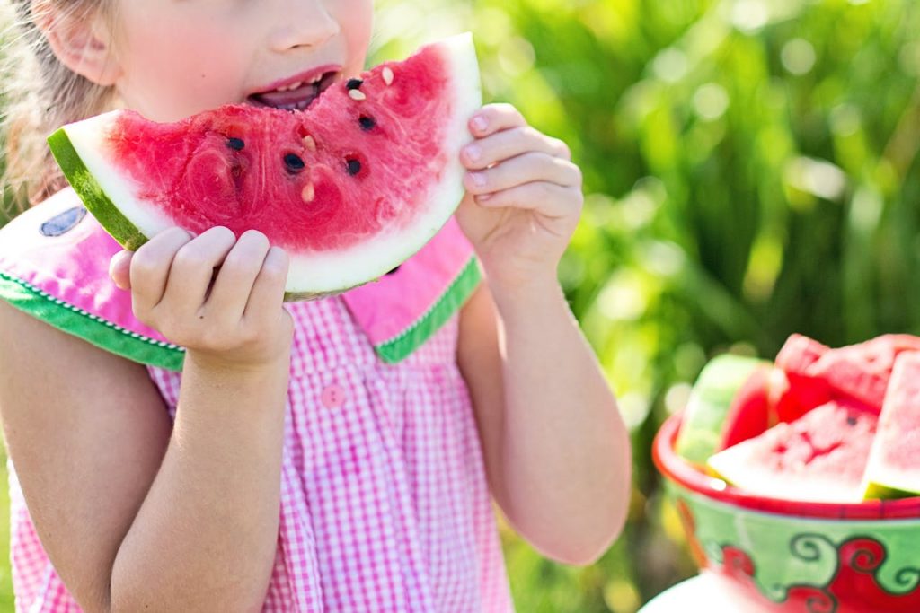 watermelon summer little girl eating watermelon food.jpg